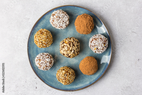 Homemade energy balls of dried fruits, nuts and oatmeal. Top view. photo