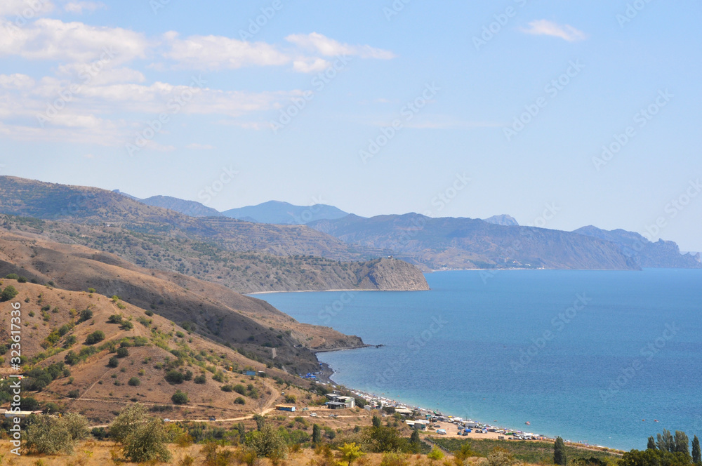 Beautiful view of the sea and mountains from the shore. Crimea
