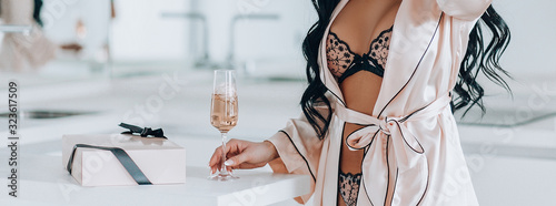 beautiful girl opens gifts. On white background