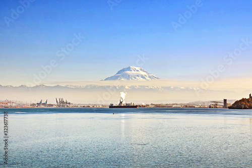 Mount Rainier over Tacoma, Washington, USA.Views of the volcano from the side of Commensement Bay. October, 2019. photo