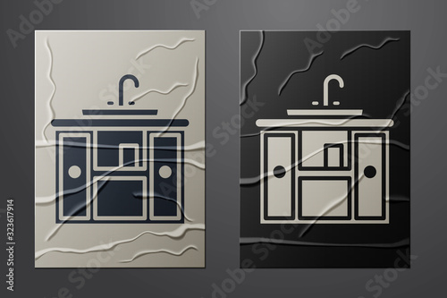 White Washbasin cabinet with water tap icon isolated on crumpled paper background. Paper art style. Vector Illustration