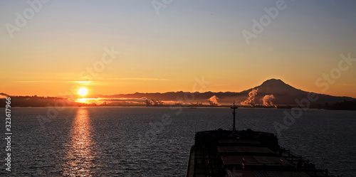 Mount Rainier over Tacoma, Washington, USA.Views of the volcano from the side of Commensement Bay. October, 2019. photo