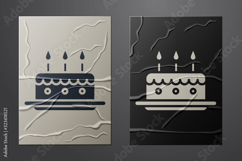 White Cake with burning candles icon isolated on crumpled paper background. Happy Birthday. Paper art style. Vector Illustration