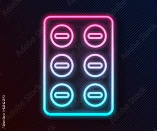 Glowing neon line Pills in blister pack icon isolated on black background. Medical drug package for tablet, vitamin, antibiotic, aspirin. Vector Illustration