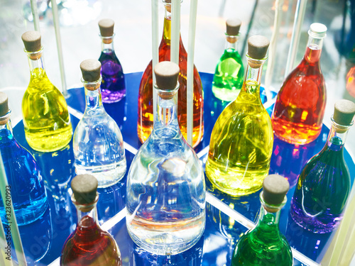 Glass bottles with colored liquids