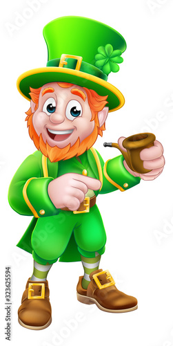 A Leprechaun St Patricks Day cartoon character mascot holding a pipe and pointing