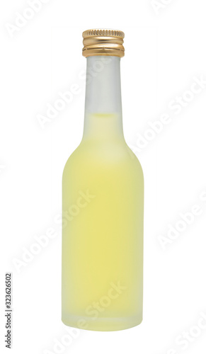 Small bottle with yellow liquid on a white background. Looks like Russian vodka