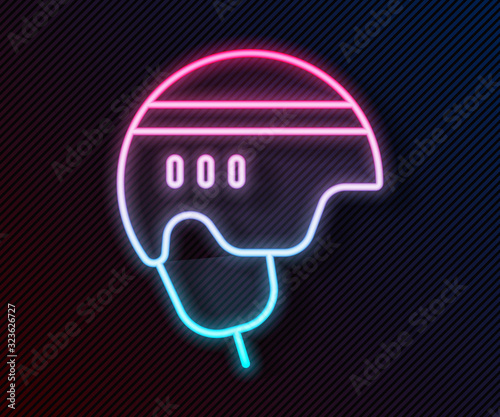 Glowing neon line Hockey helmet icon isolated on black background. Vector Illustration photo