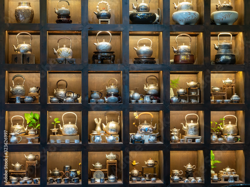 Different iron pots in the window © onlyyouqj