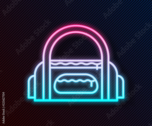 Glowing neon line Sport bag icon isolated on black background. Vector Illustration