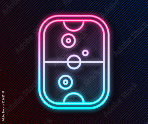 Glowing neon line Air hockey table icon isolated on black background. Vector Illustration