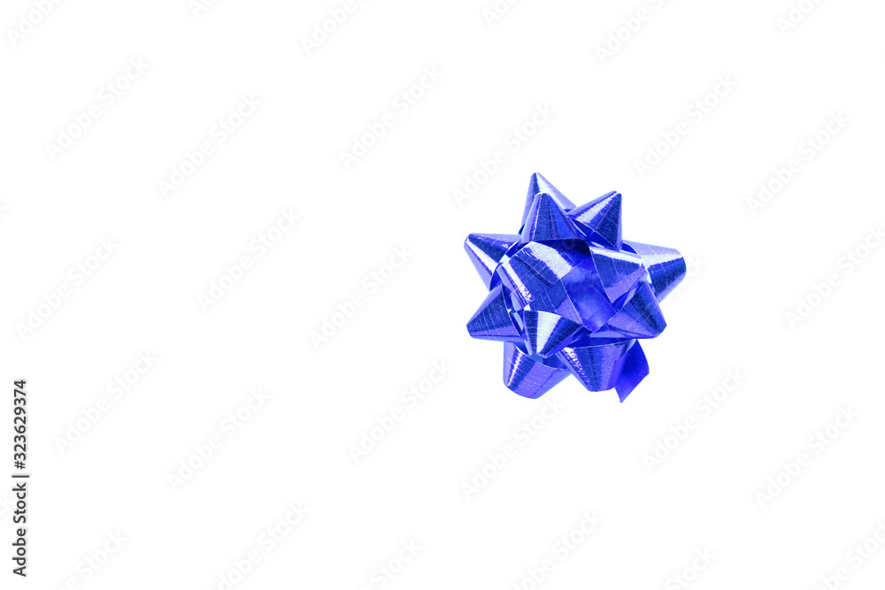 Voluminous blue gift festive bow on white background with copy space Voluminous blue gift festive bow on white background with copy space
