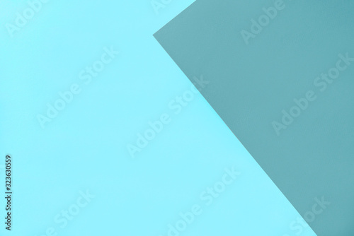 Texture background with green and blue sheets of paper