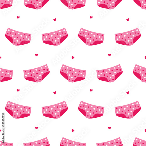 Cute pink cartoon style panties, underwear with hearts seamless pattern background.