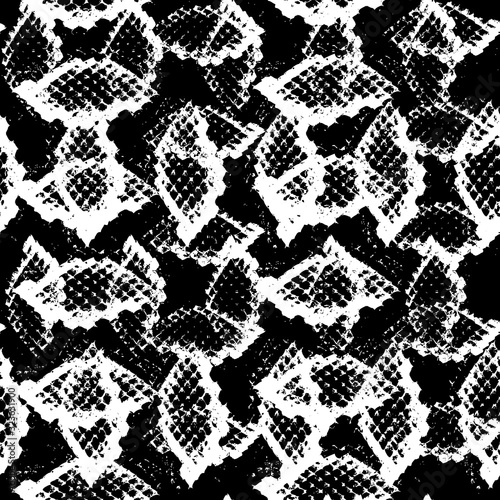 Snake skin scales texture. Seamless pattern black white background. simple ornament, fashion print and trend of the season Can be used for Gift wrap, fabrics, wallpapers. Vector