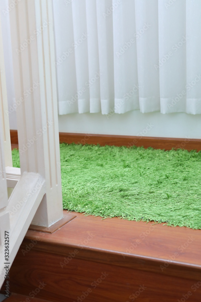 green carpet covering on laminate wooden stair green carpet covering on laminate wooden stair