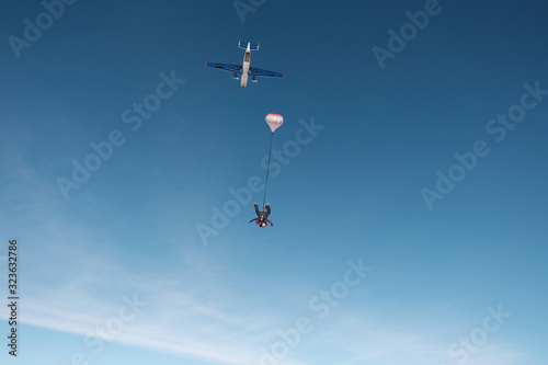 Skydiving. Tandem jump. Winter fun.