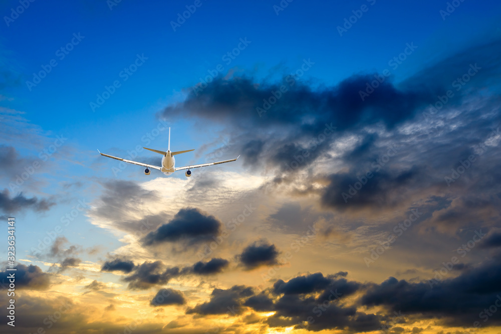 High-altitude airplane and beautiful sky at dusk