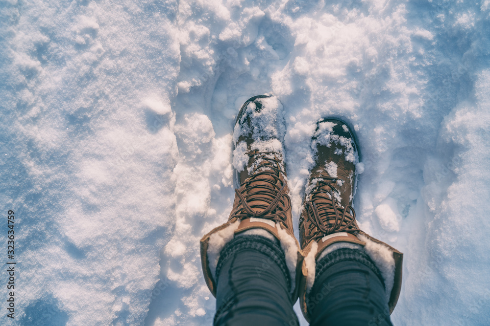 Winter hiking in Snow boots walking first person POV selfie of feet in deep  cold snowfall in outdoors forest. Girl taking picture of her shoes. Photos  | Adobe Stock