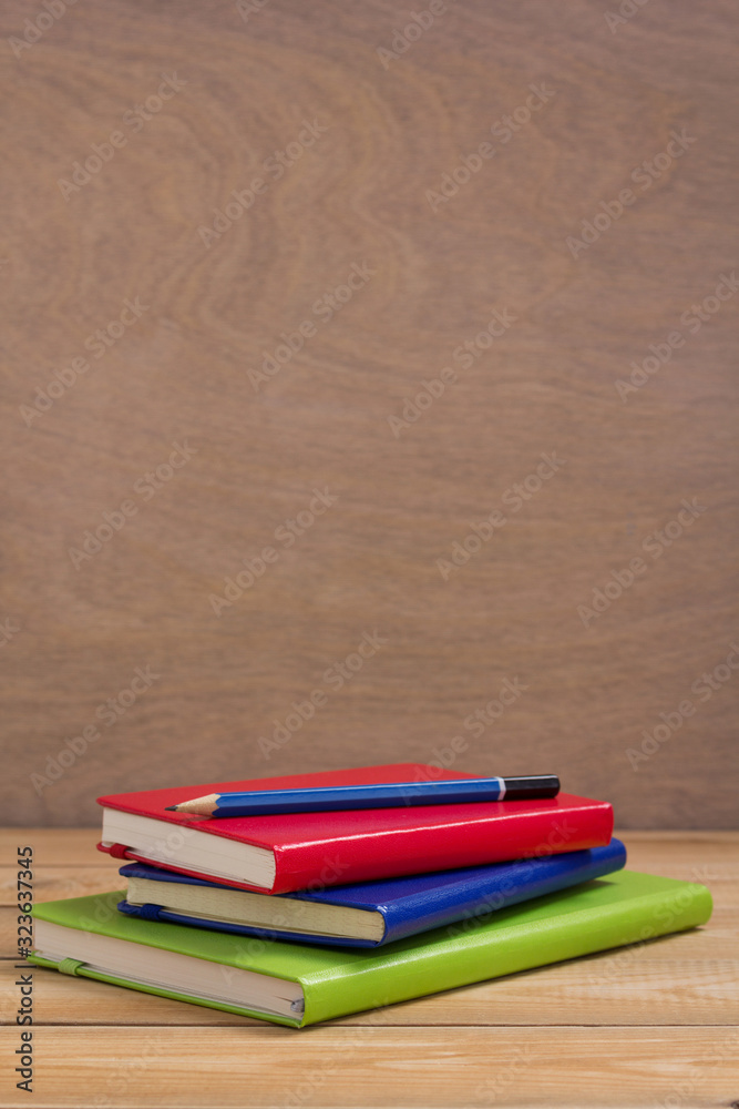 notepad or paper notebook at wooden table notepad or paper notebook at wooden table
