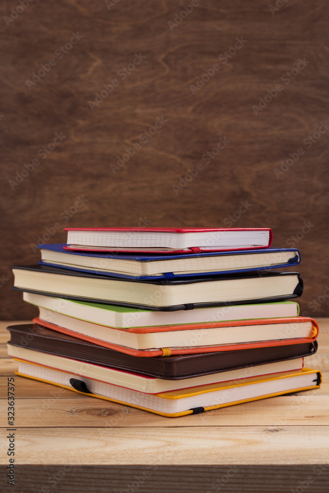 notepad or paper notebook at wooden table notepad or paper notebook at wooden table