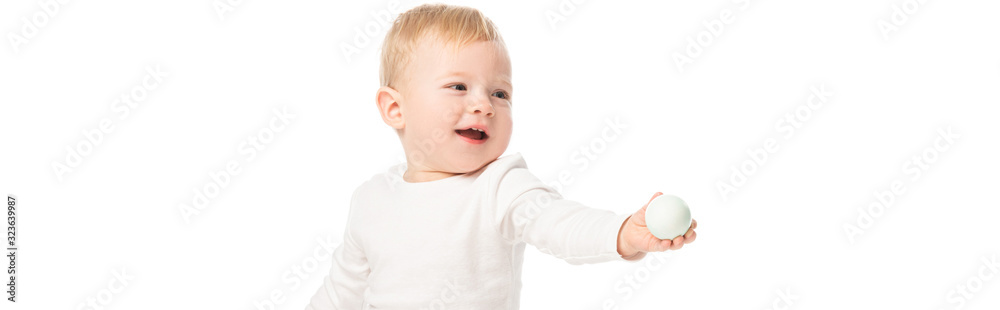 Cute child holding easter egg in outstretched hand with open mouth isolated on white, panoramic shot Cute child holding easter egg in outstretched hand with open mouth isolated on white, panoramic shot