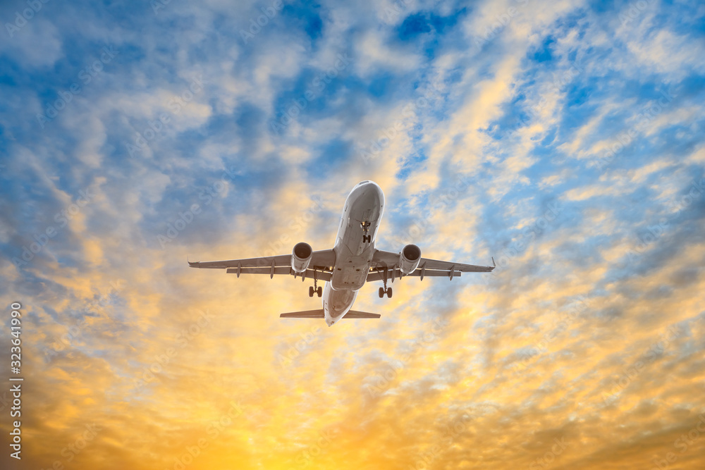 High-altitude airplane and beautiful sky at dusk