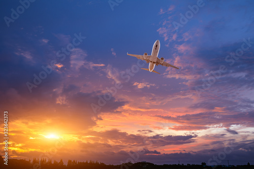 High-altitude airplane and beautiful sky at dusk
