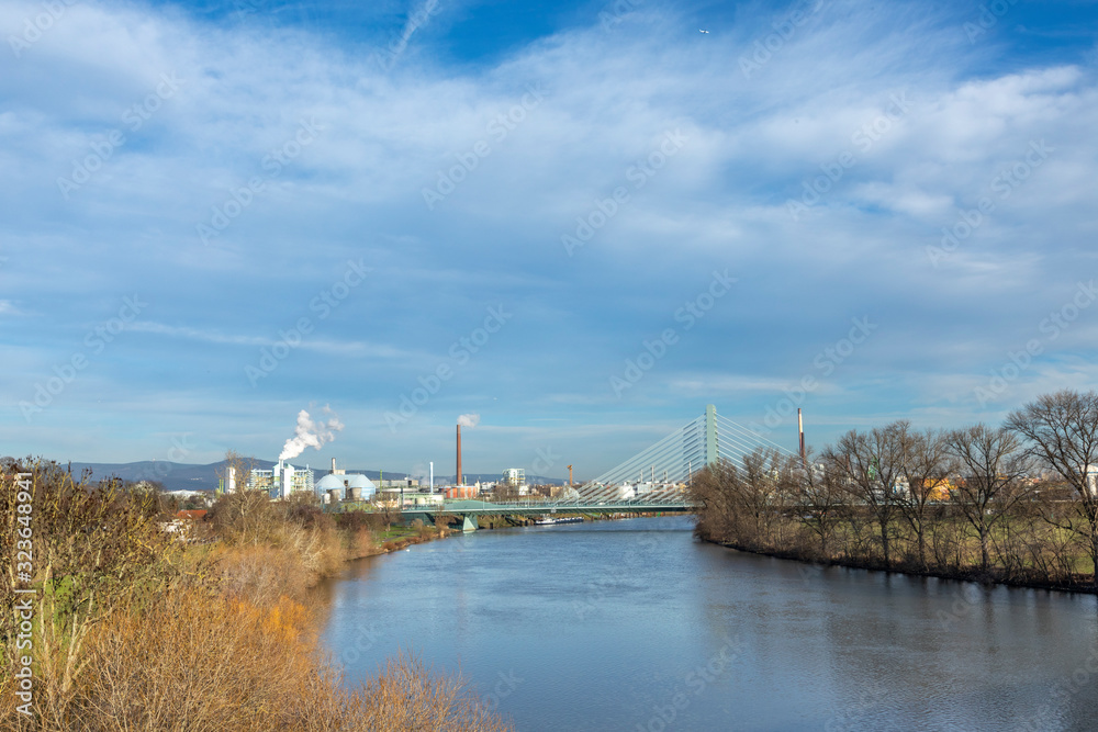 view to Hoechst industry area with bridge spanning river Main in Frankfurt view to Hoechst industry area with bridge spanning river Main in Frankfurt