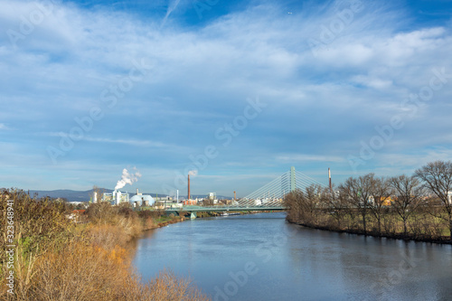 view to Hoechst industry area with bridge spanning river Main in Frankfurt © travelview