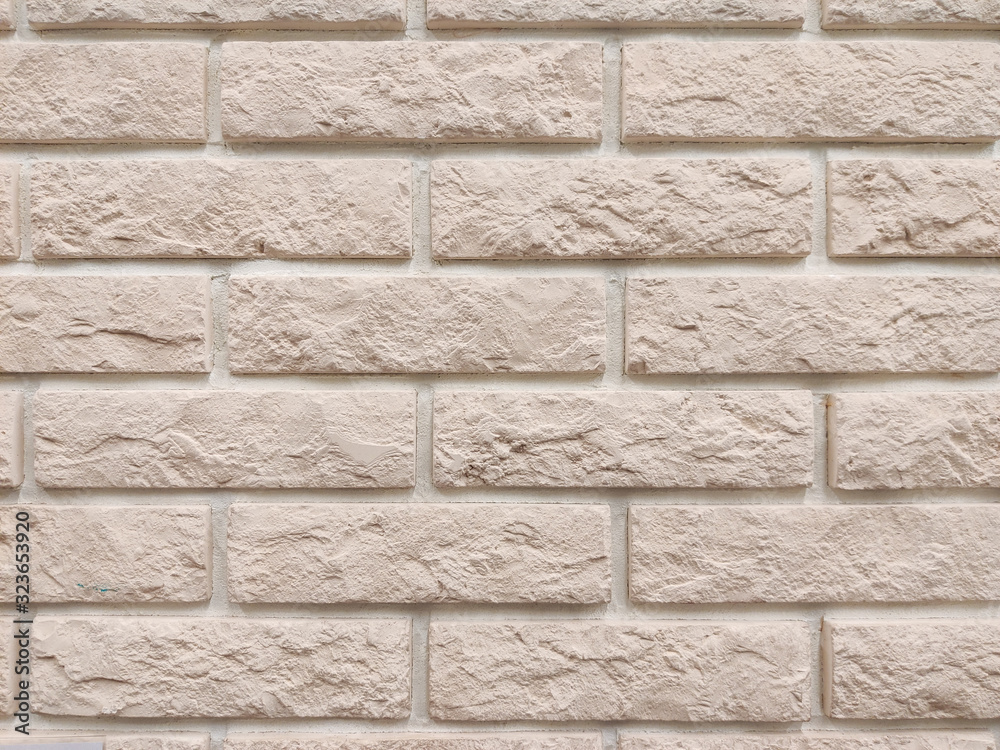 Fototapeta premium background of the wall is a brown brick surface. Abstract wall background.