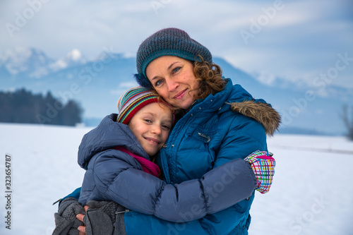 Mother and daughter bonding during winter holiday