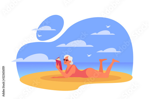 Happy and active senior spending time on the beach.