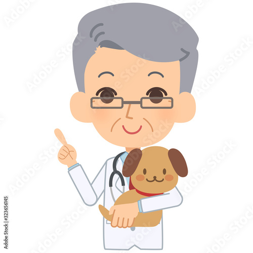 説明をする獣医と犬