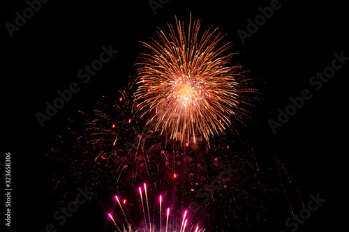 Colorful fireworks festivals on black background.