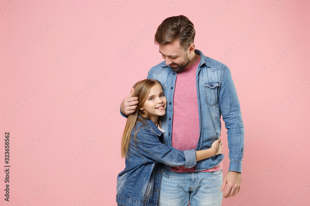 Pretty bearded man in casual clothes have fun with cute child baby girl. Father little kid daughter isolated on pastel pink background in studio. Love family parenthood childhood concept. Hugging. Pretty bearded man in casual clothes have fun with cute child baby girl. Father little kid daughter isolated on pastel pink background in studio. Love family parenthood childhood concept. Hugging.