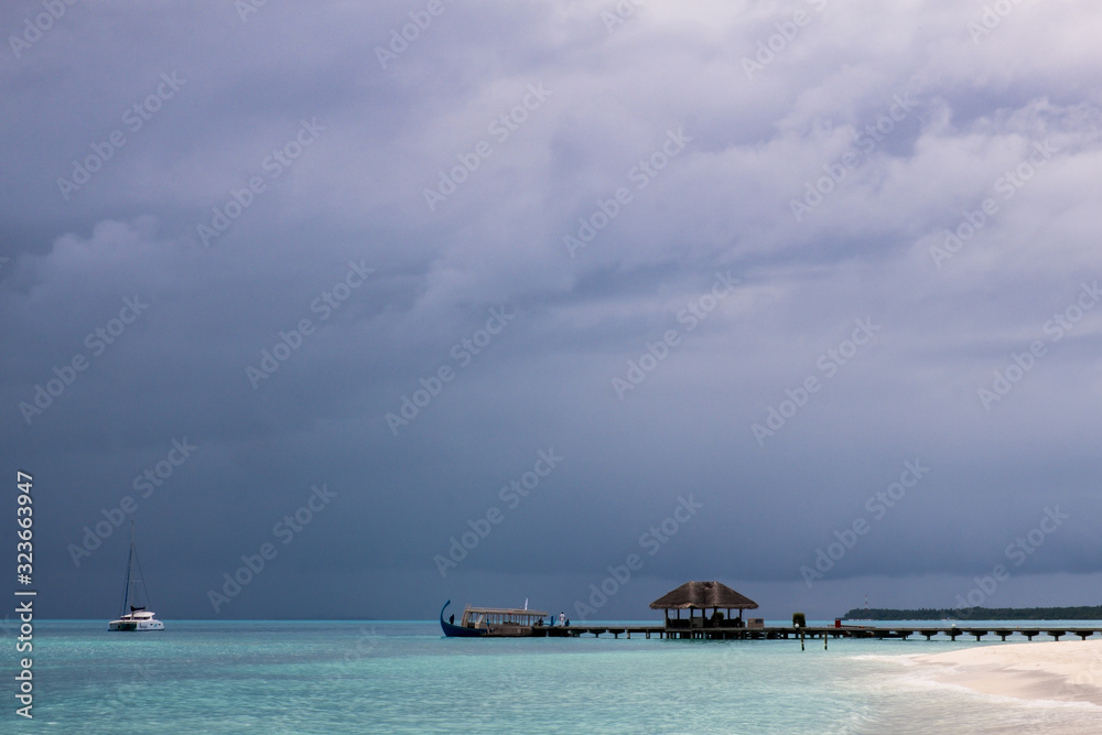 wooden pier over the sea in maldives