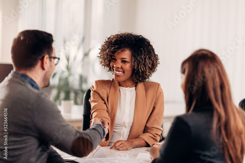 Business people shaking hands after meeting photo