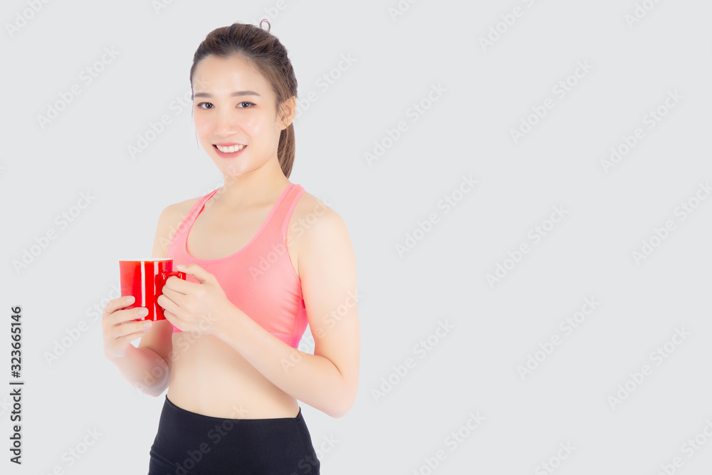 Beautiful young asian woman in sport after workout drinking water from glass for thirsty isolated on white background, girl after exercise drink coffee or tea for hydration and refresh with healthy. Beautiful young asian woman in sport after workout drinking water from glass for thirsty isolated on white background, girl after exercise drink coffee or tea for hydration and refresh with healthy.