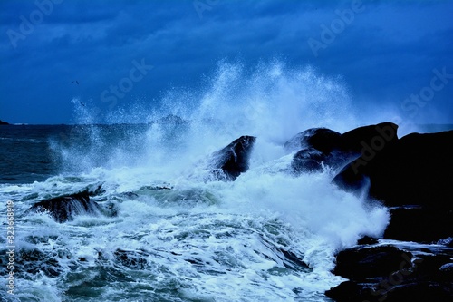 storm on the beautiful pink granite coast of Ploumanach in Brittany. France