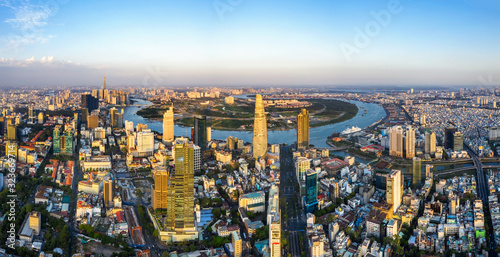 Top view aerial of Thu Thiem peninsula and center Ho Chi Minh City  with development buildings, transportation, energy power infrastructure. Financial and business centers in developed Vietnam