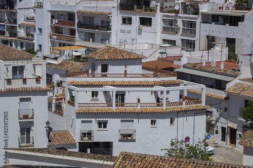 Beautiful aerial view of Mijas - Spanish hill town overlooking the Costa del Sol, not far from Malaga. Mijas known for its white-washed buildings. Mijas, Andalusia, Spain. photo