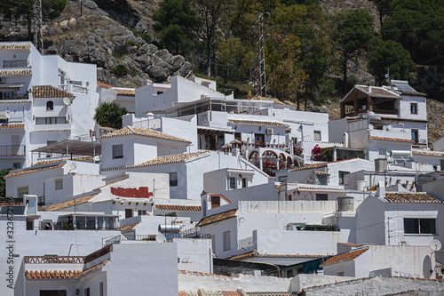 Beautiful aerial view of Mijas - Spanish hill town overlooking the Costa del Sol, not far from Malaga. Mijas known for its white-washed buildings. Mijas, Andalusia, Spain.