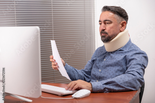 Middle aged man with a neck brace