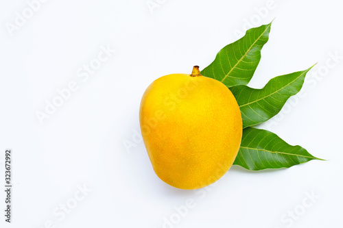 Tropical fruit, Mango with leaves on white background. photo