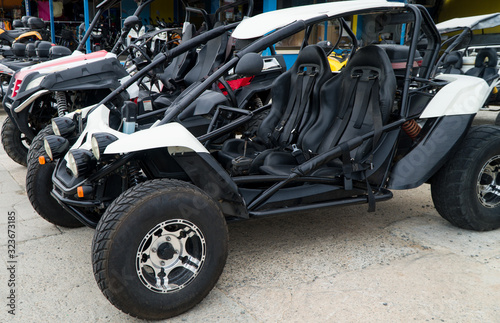 Off Road buggy on the street. Car rentals.