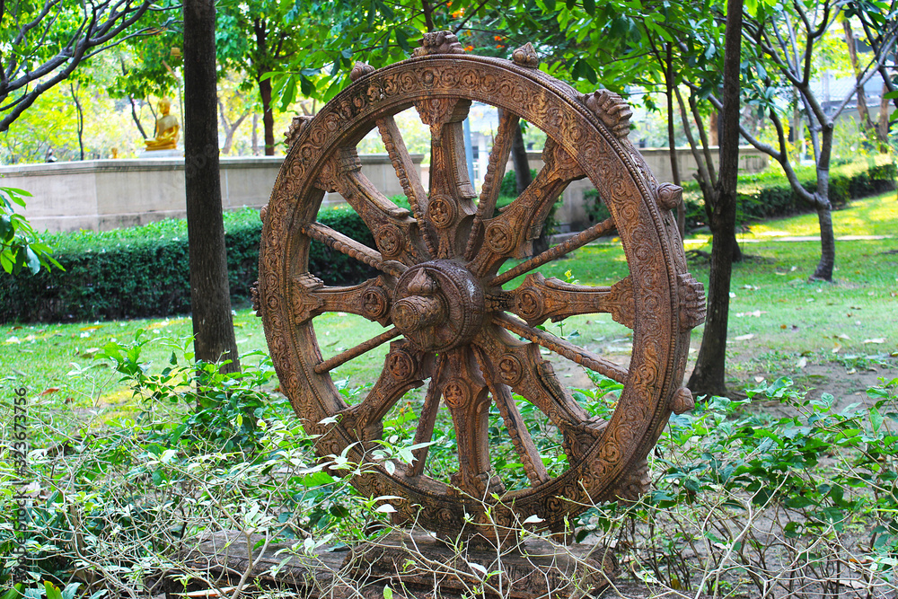 Dharmachakra-the wheel of dhamma in a Dhamma park Dharmachakra-the wheel of dhamma in a Dhamma park