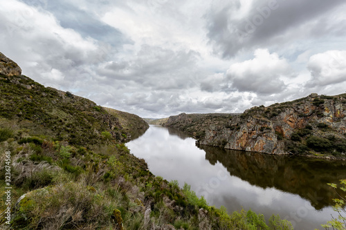 Cloudy landscape with river and cliffs in Arribes del Duero. Spain. The Arribes del Duero Natural Park.