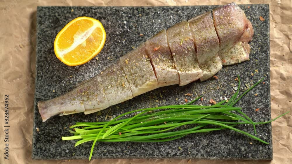 Cooking. Fish, onions Board. sprinkle with pepper Cooking. Fish, onions Board. sprinkle with pepper
