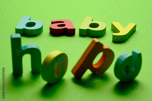 Word BABY HOPE on green background.Learning the English alphabet and language.The concept of child education, school, kindergarten